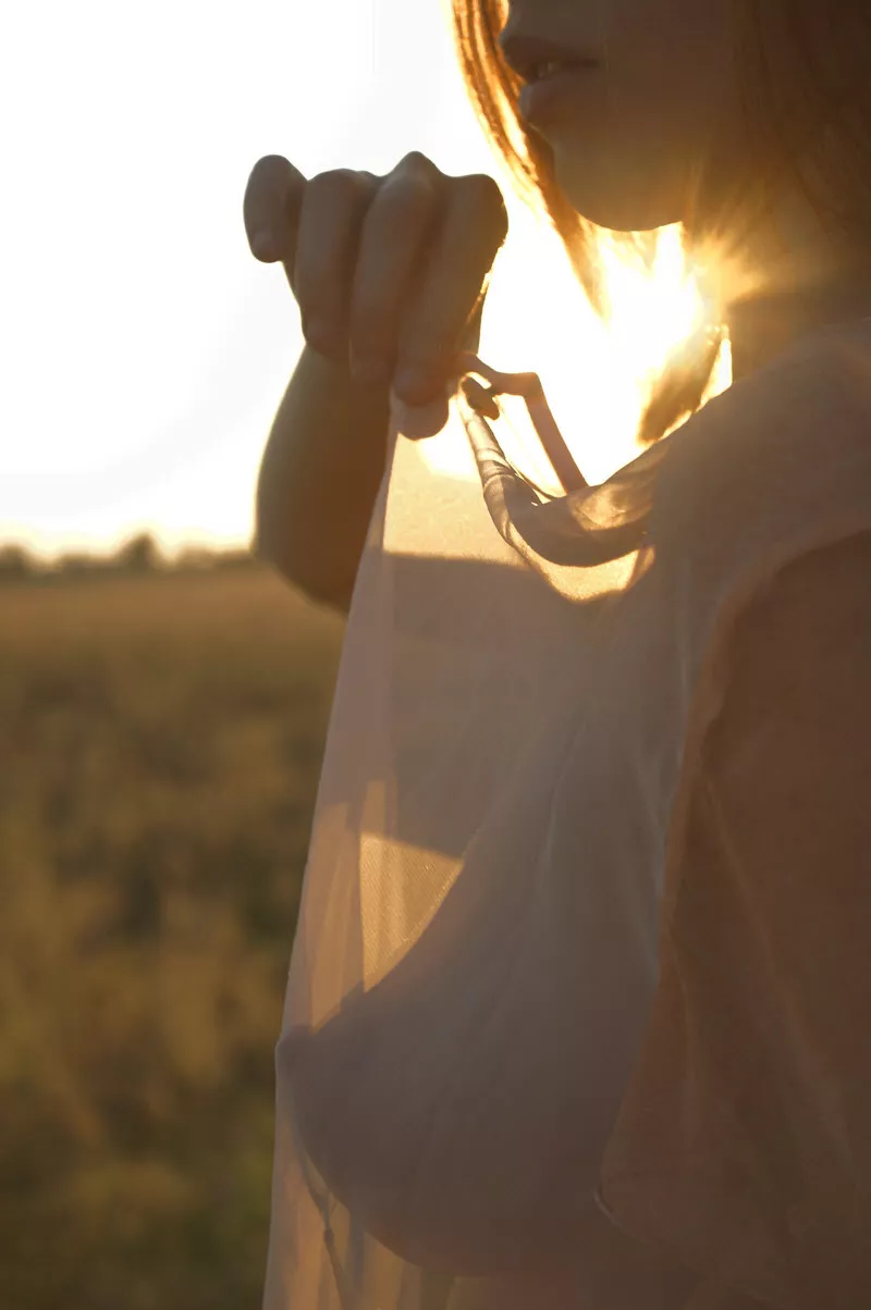 Sun through her shirt