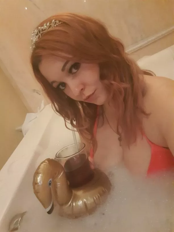 Taking a bath with a bird and some wine