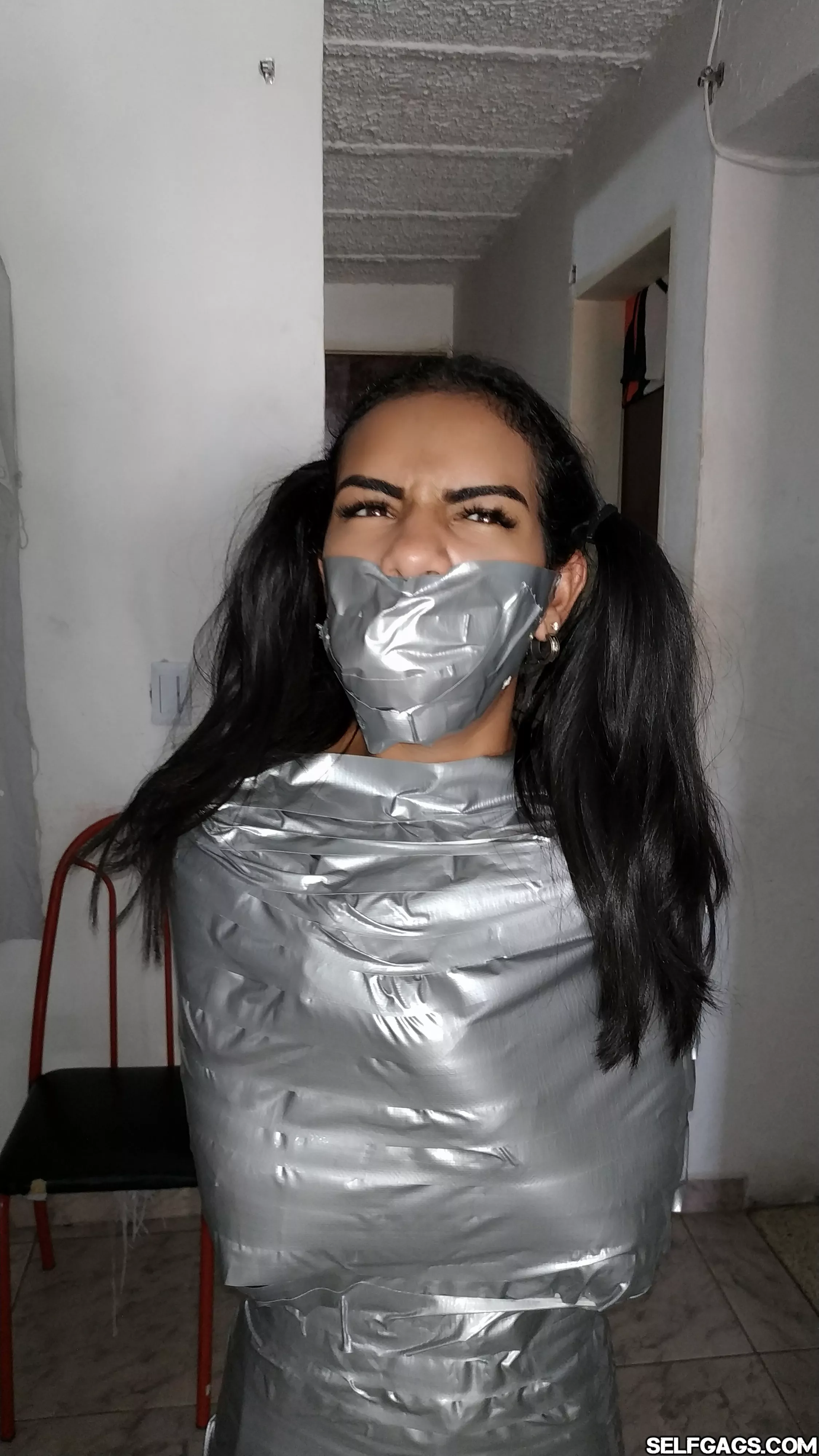 Tape Gagged Latina Mummy