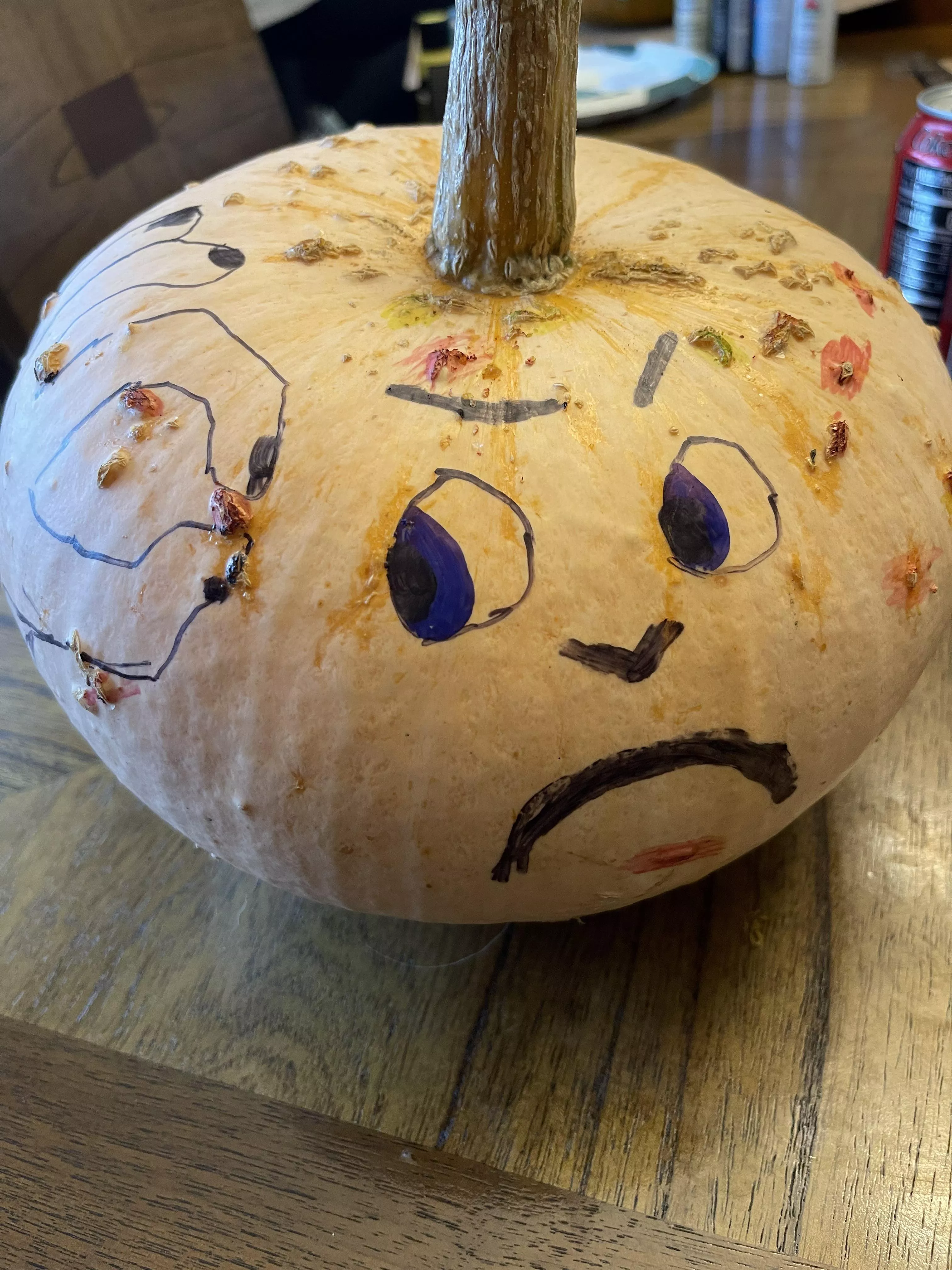 The only rational decoration for a pumpkin with so many lumps and bumps….