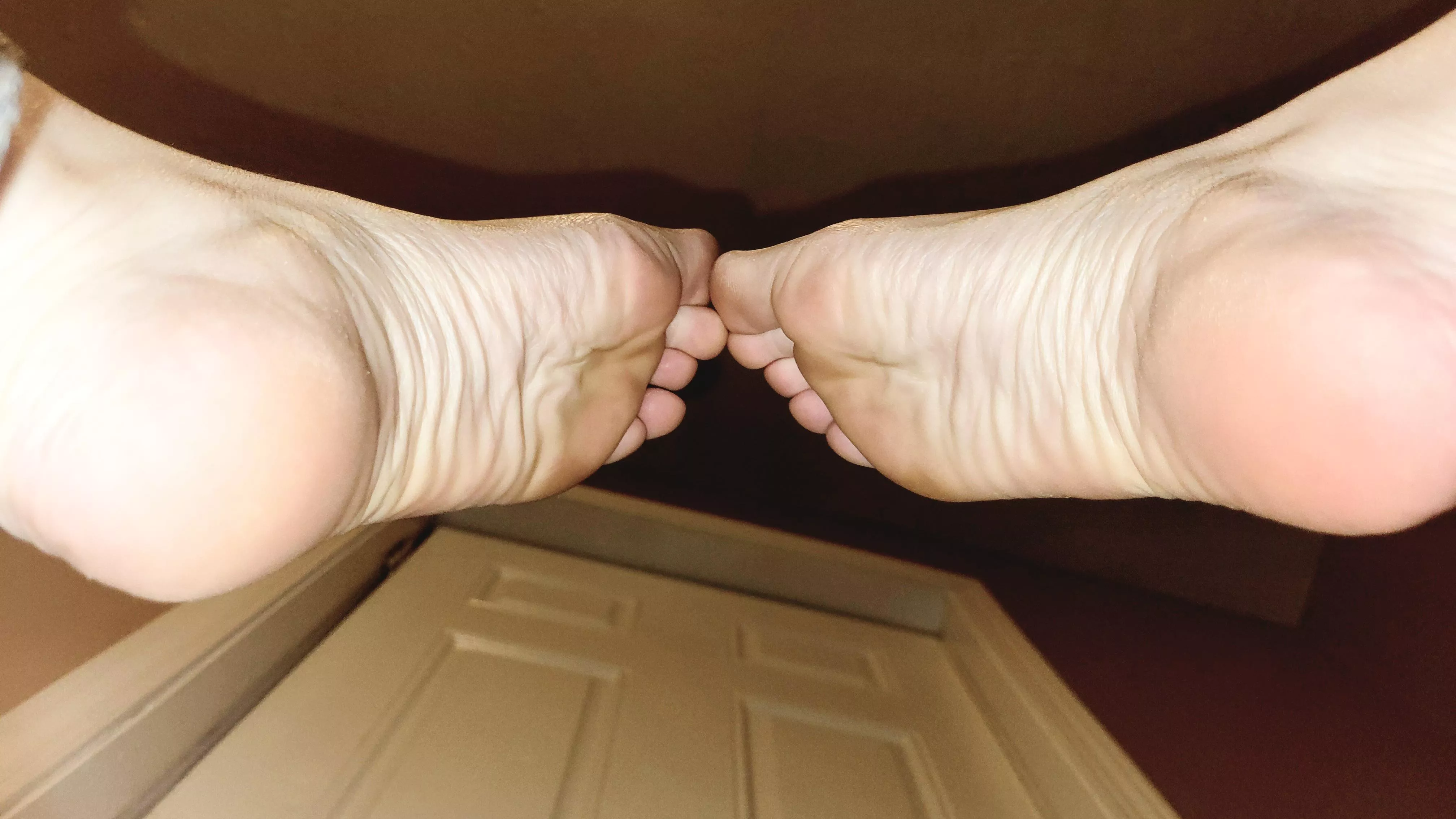 The soles of a woman on her feet all day.