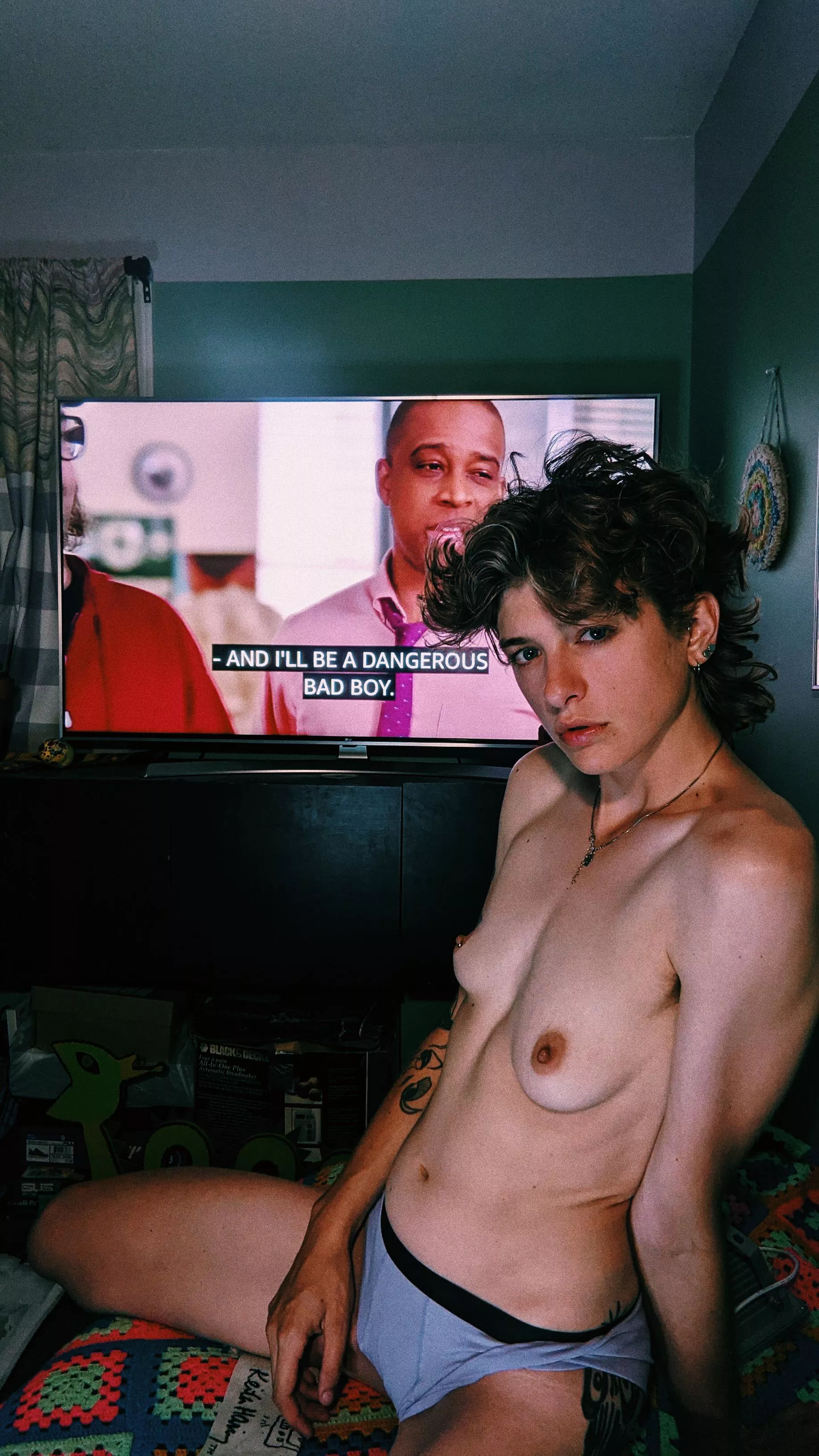 This photo is just missing my strap on...featuring perfectly timed captions on the tv ðŸ˜…