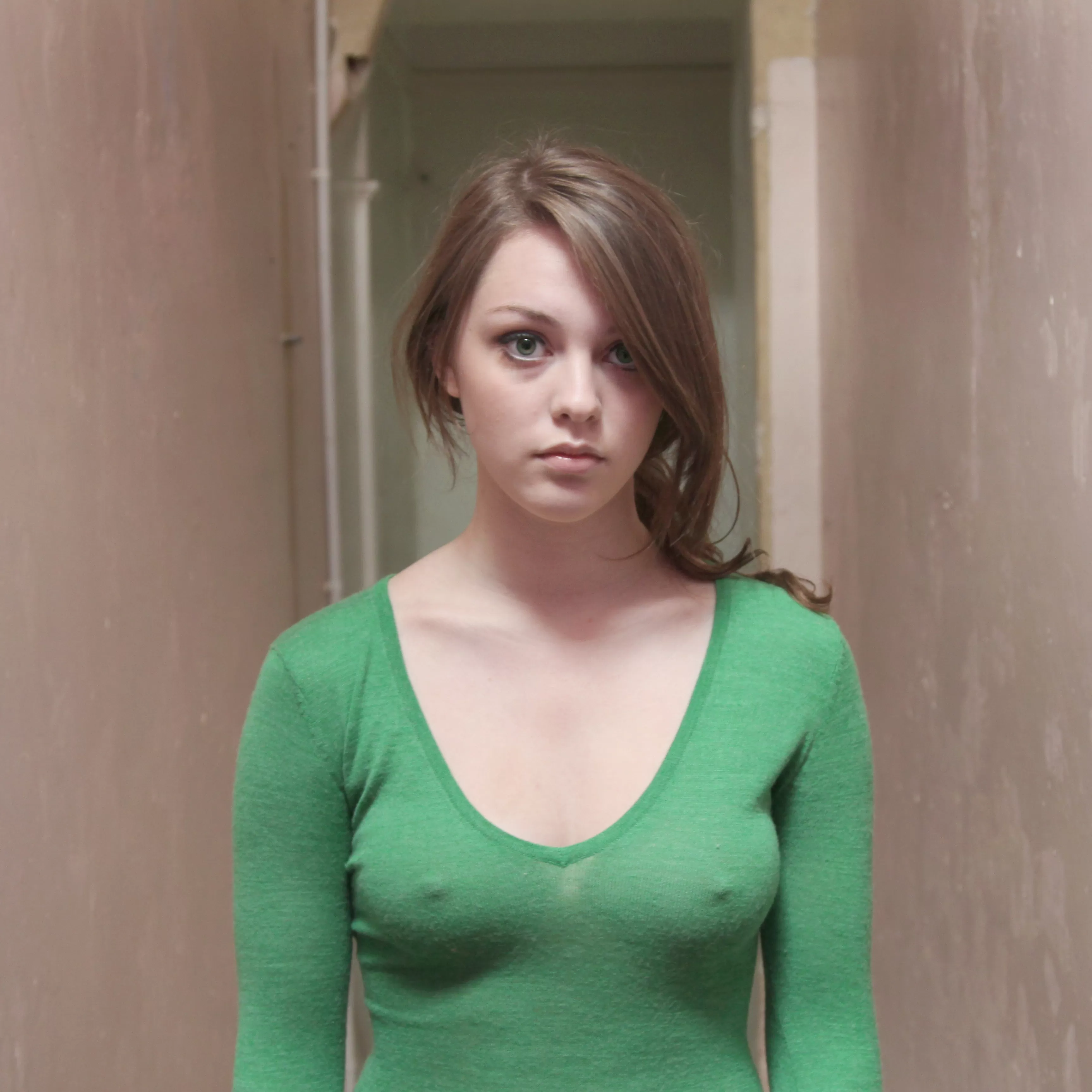 Tight green sweater