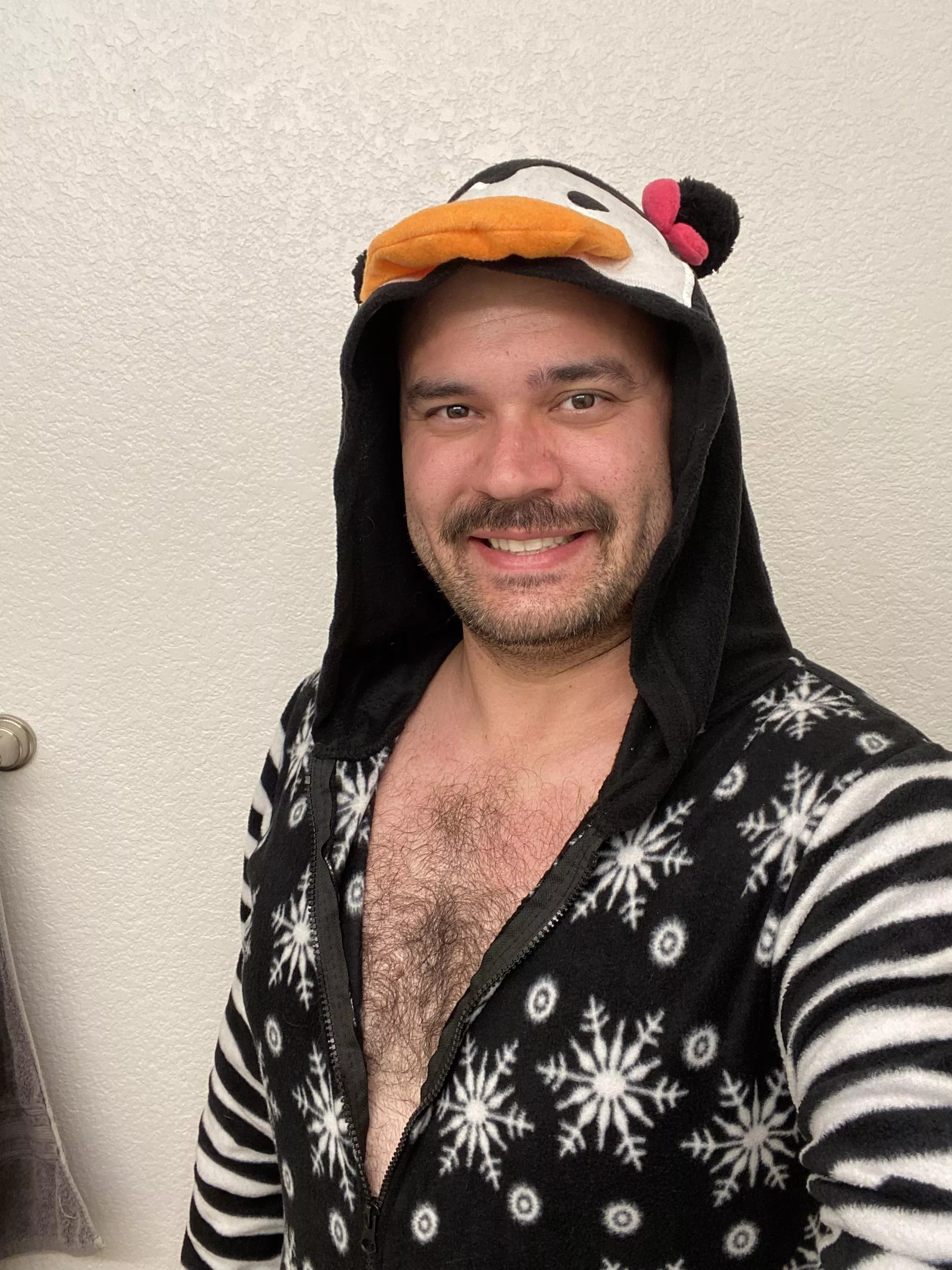 Today was holiday dress up day at work. So I put on my holiday penguin outfit. Showing off the chest here for the guys. ðŸ˜‰