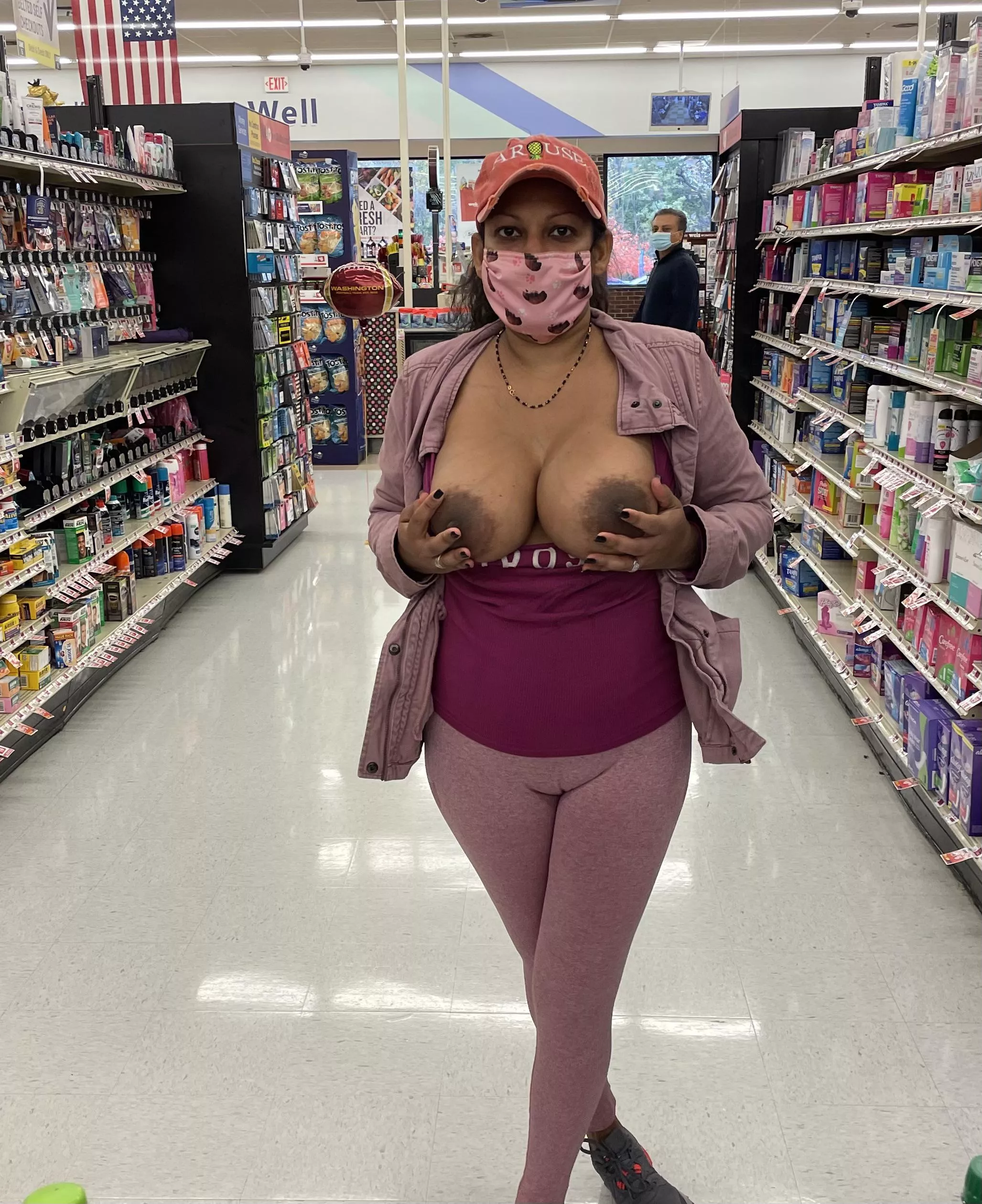 Trini wife sharing her huge tits with shoppers!