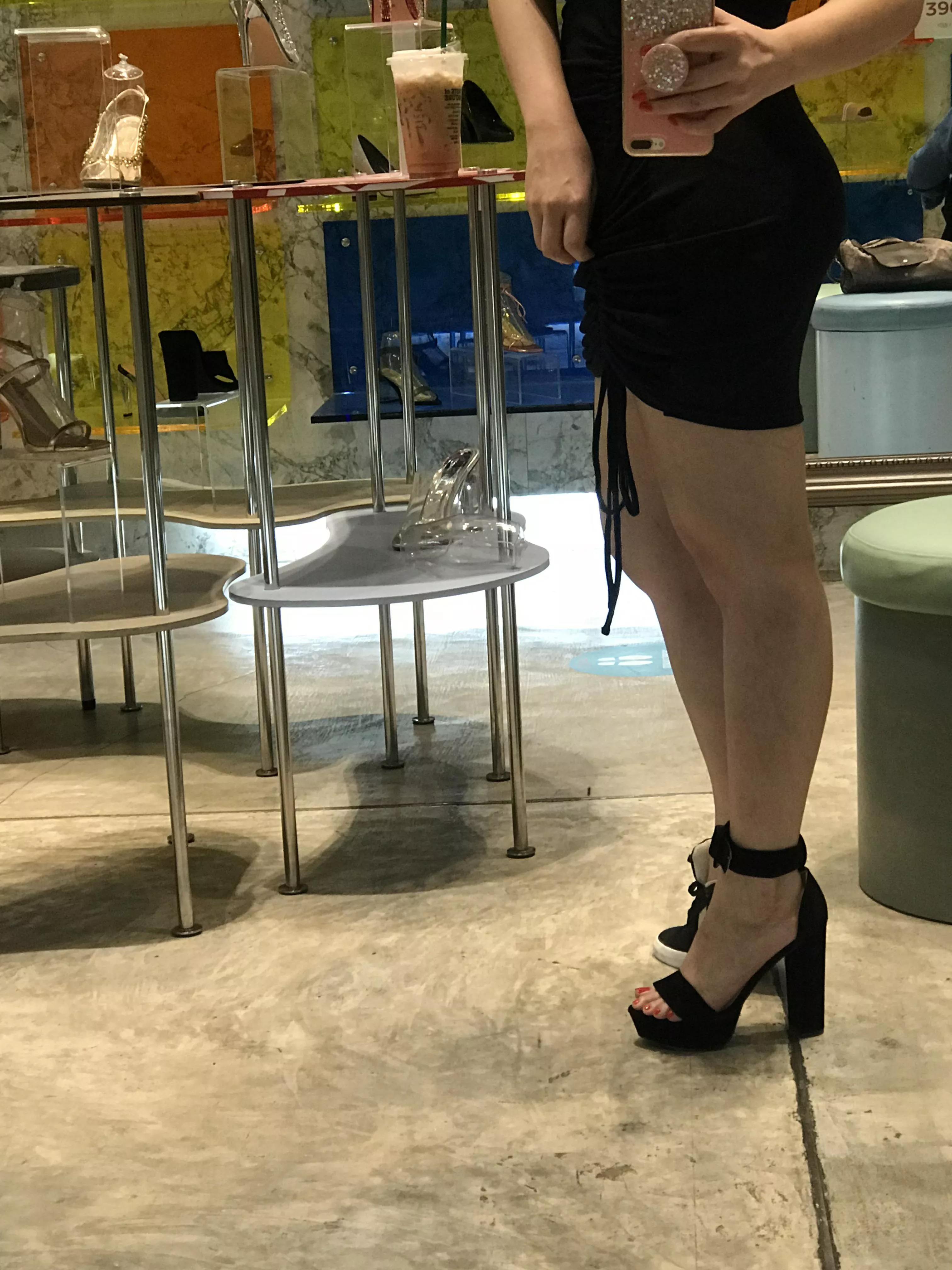 Trying on a new black heel at the store... do you like this one?