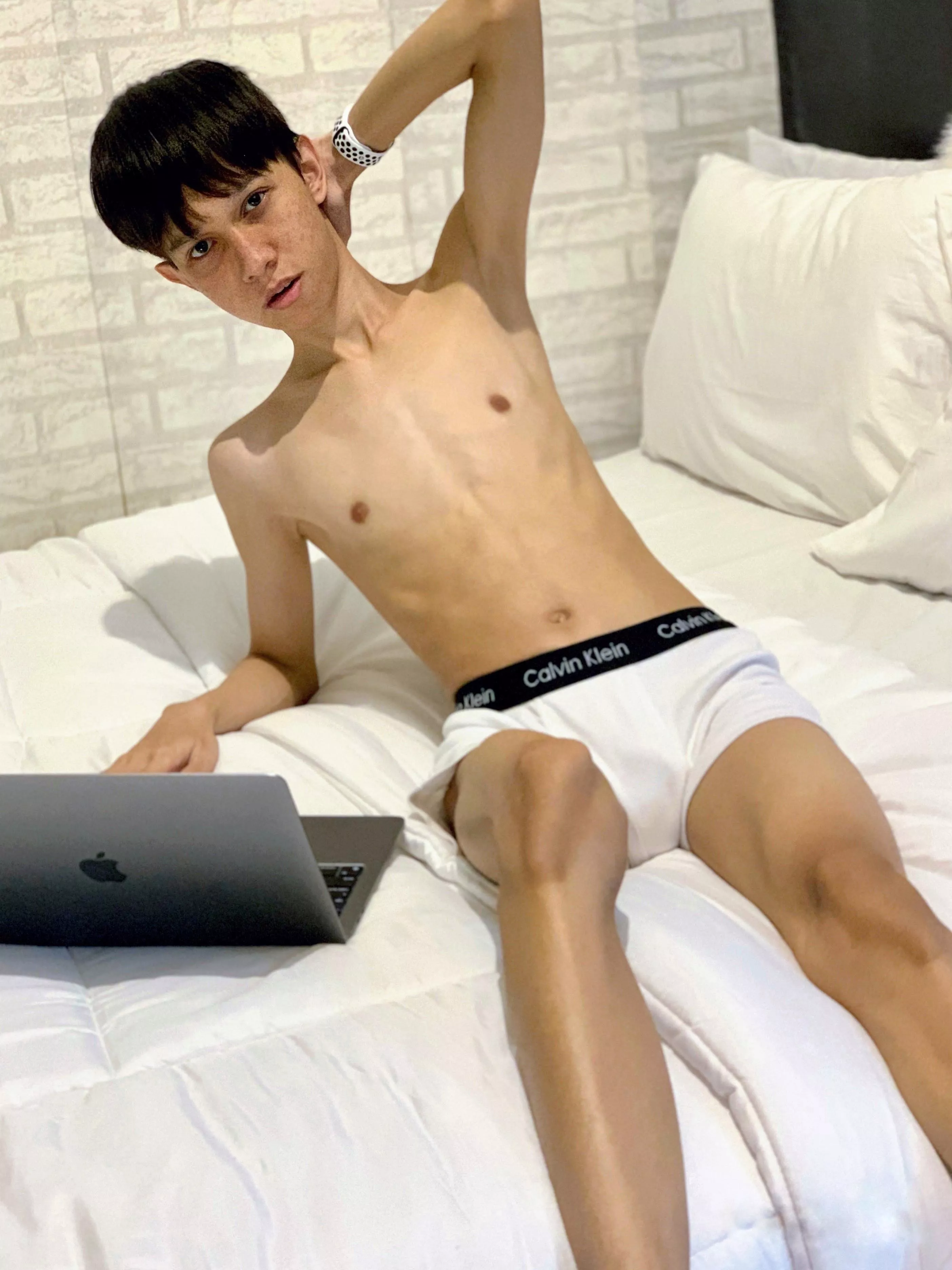 Twink boy watching p*rn in bed 💦