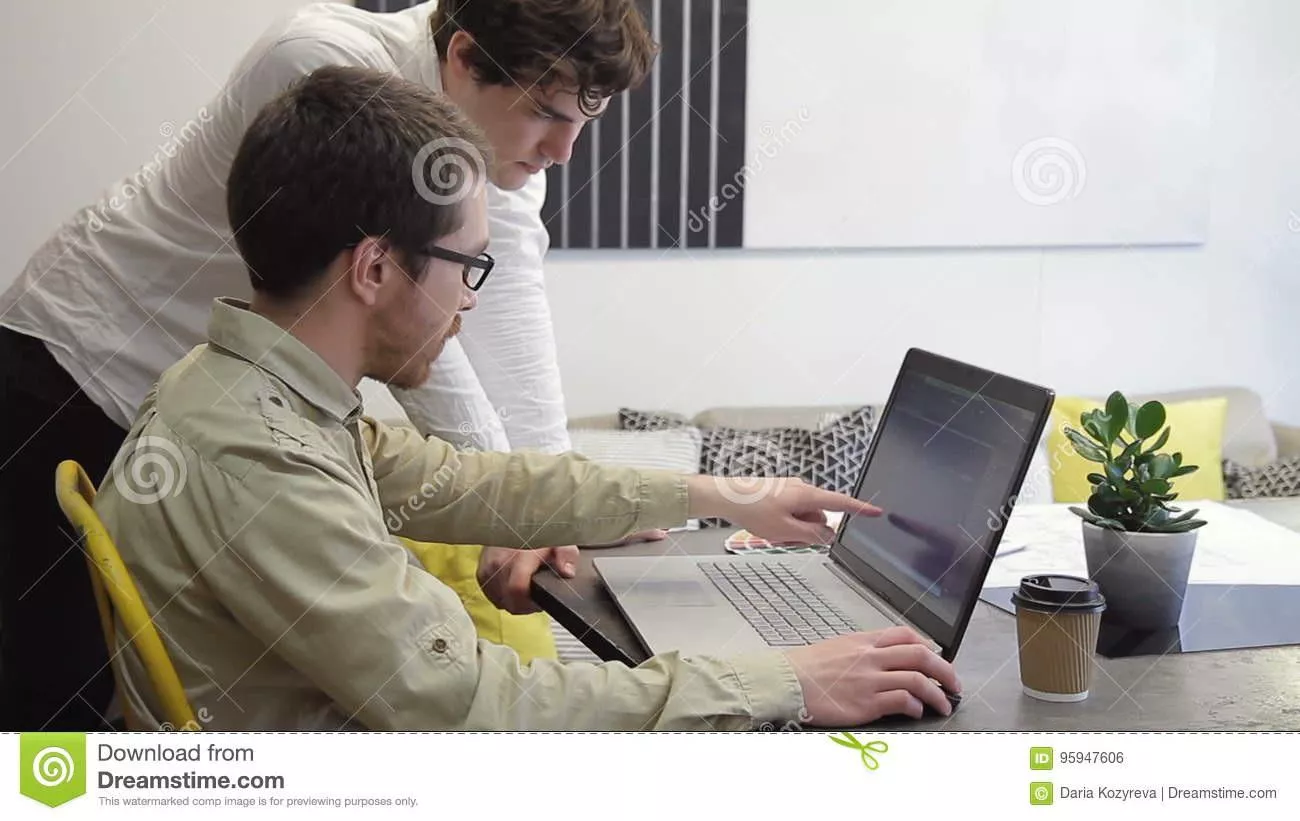 Two men working in an office environment. How beautiful and wholesome!