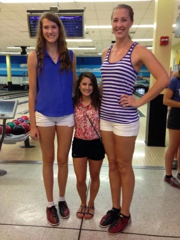 UCFâ€™s two tallest Volleyball players and their shortest cheerleader