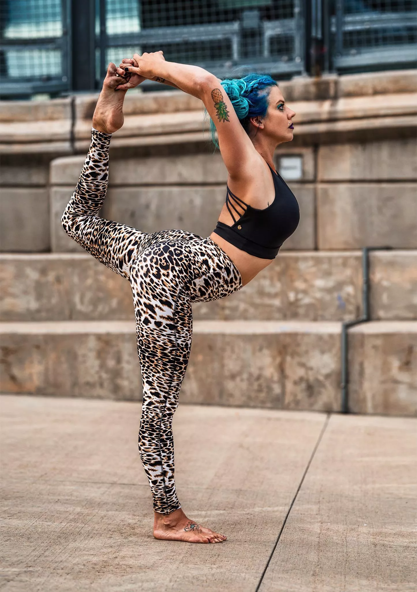 Yoga girl doing dancer pose.