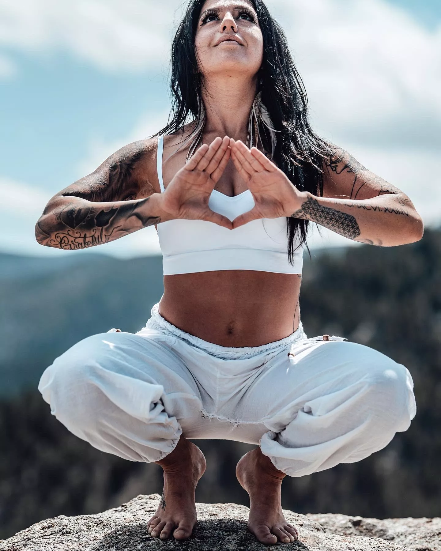 Yoga toes balancing on top of the mountain